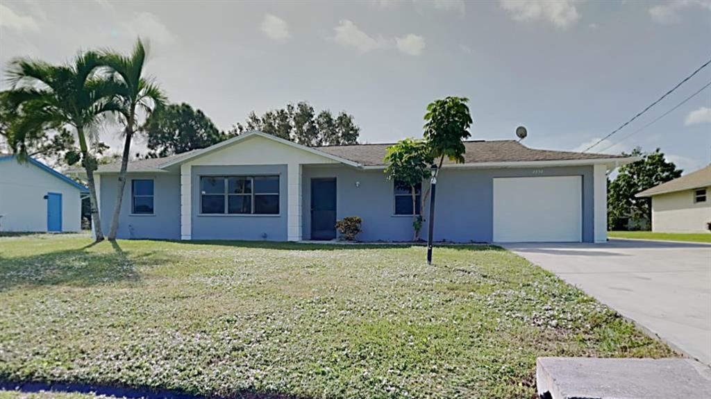 Photo of 2238 SE Tiffany Avenue, Port Saint Lucie, FL 34952 (MLS # R10757144)