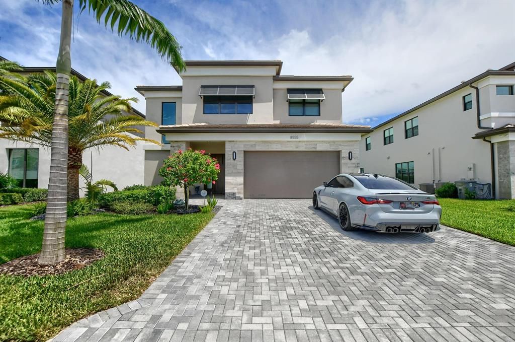 Photo of 8555 Apple Falls Lane, Boca Raton, FL 33496 (MLS # R10827196)