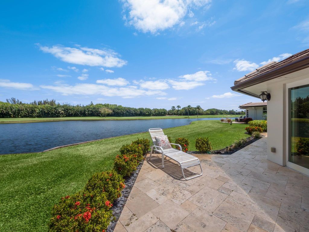 Photo of 302 Cedar Key Circle, Atlantis, FL 33462 (MLS # R10979962)