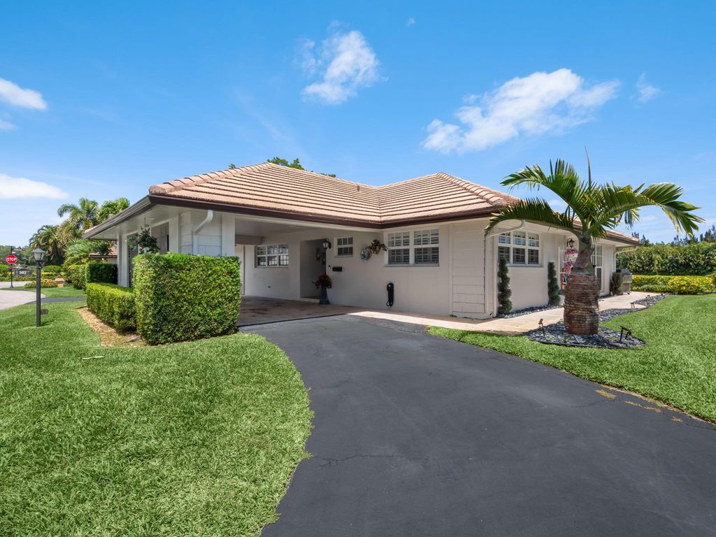 Photo of 302 Cedar Key Circle, Atlantis, FL 33462 (MLS # R10979962)