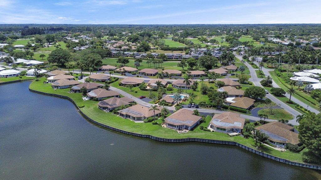 Photo of 302 Cedar Key Circle, Atlantis, FL 33462 (MLS # R10979962)