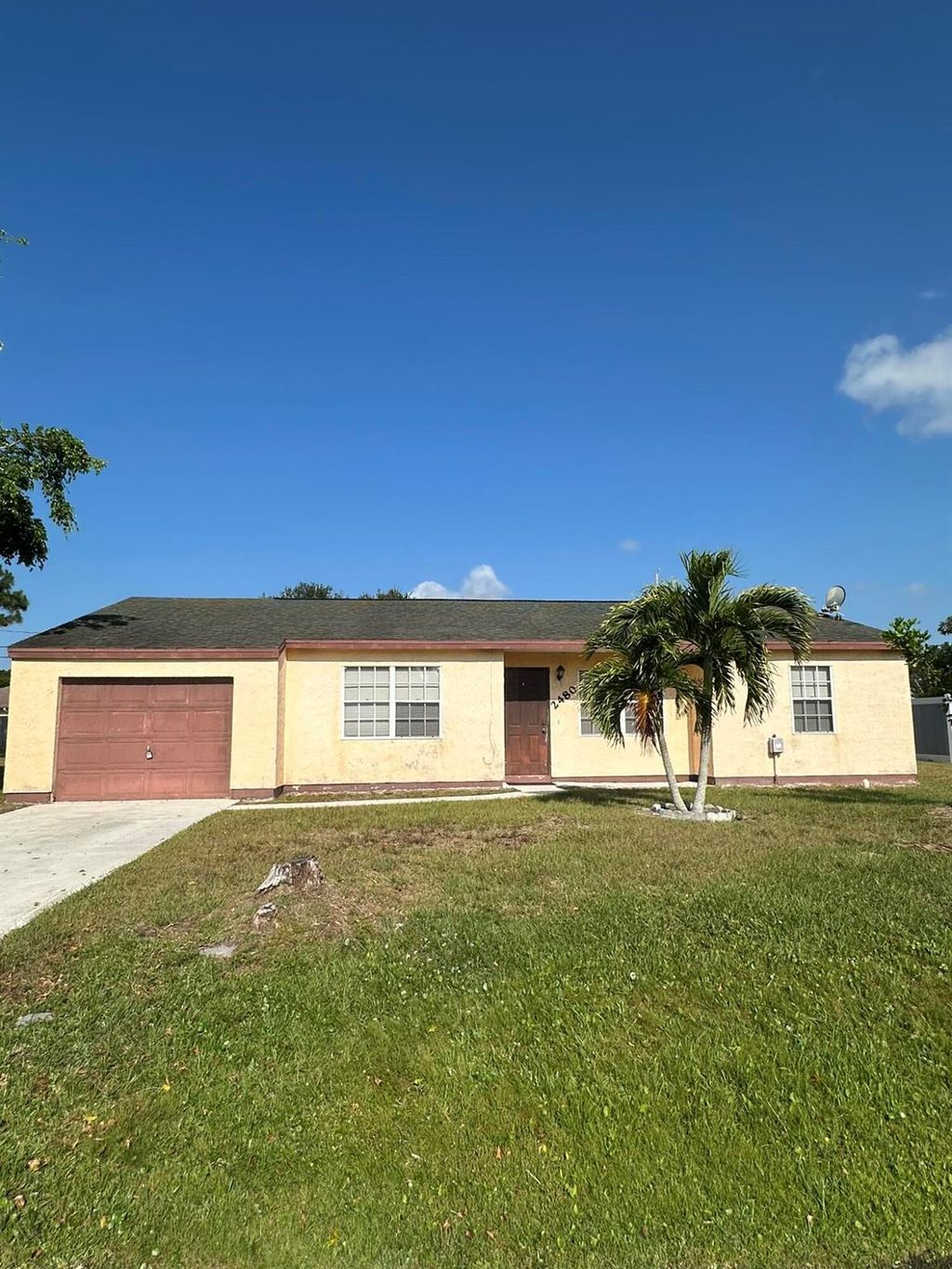 Photo of 2480 SE Rock Springs Drive, Port Saint Lucie, FL 34952 (MLS # R11089601)