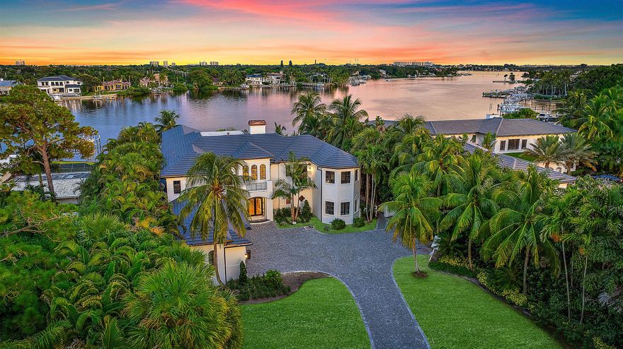 Welcome to your stunning riverfront estate, completely renovated in 2024 by the award-winning Turtle Beach Construction. This exceptional property, located in the heart of Tequesta, offers nearly an acre of land with endless potential. The expansive front yard, accessed by a long, winding driveway, provides ample space for a guest house, garage, or other custom additions.Inside, the thoughtfully designed layout includes a spacious primary wing with breathtaking water views, oversized walk-in closets, an exercise room, and a private Zen-inspired outdoor shower. A first-floor VIP guest suite ensures comfort and privacy for visiting family and friends.
