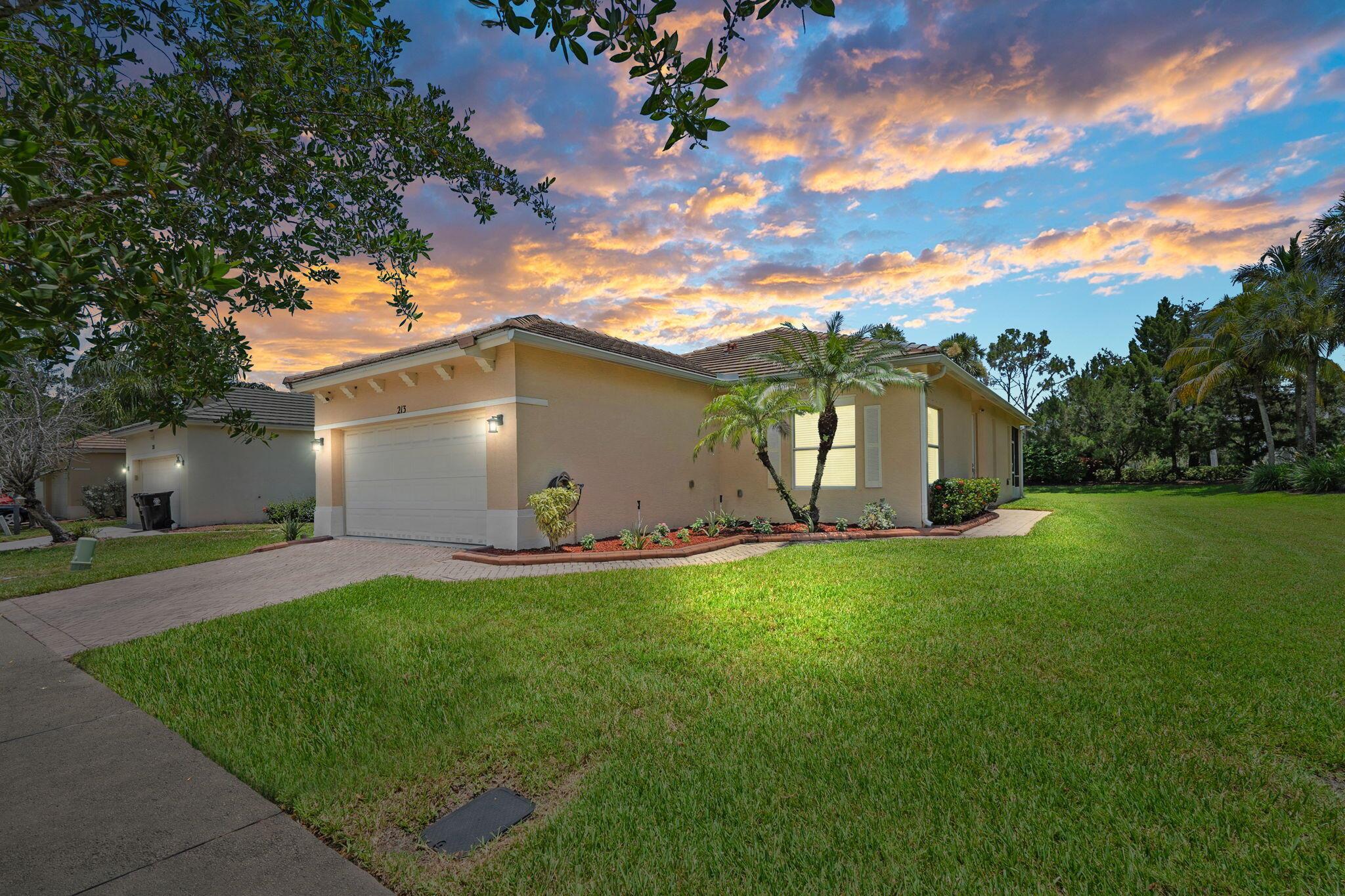 Welcome to Lake Forest Pointe in St. Lucie West. Tucked away at the end of a peaceful cul-de-sac, this 3-bed, 2-bath CBS home offers the perfect blend of privacy & comfort. Built in 2004, it features hardwood & tile flooring throughout, an open-concept layout with a spacious living room, formal dining area, & a stylish kitchen complete with quartz countertops, stainless steel appliances & a large pantry. Natural light fills the home and flows seamlessly to the screened, tiled lanai--perfect for relaxing or entertaining. The backyard backs to lush green space, creating the feel of an oversized lot. The home's tile roof, paver driveway & sidewalks add to its curb appeal. Located just a short walk to the community pool and a quick drive to shopping, dining, golf, St. Lucie West, & I-95.