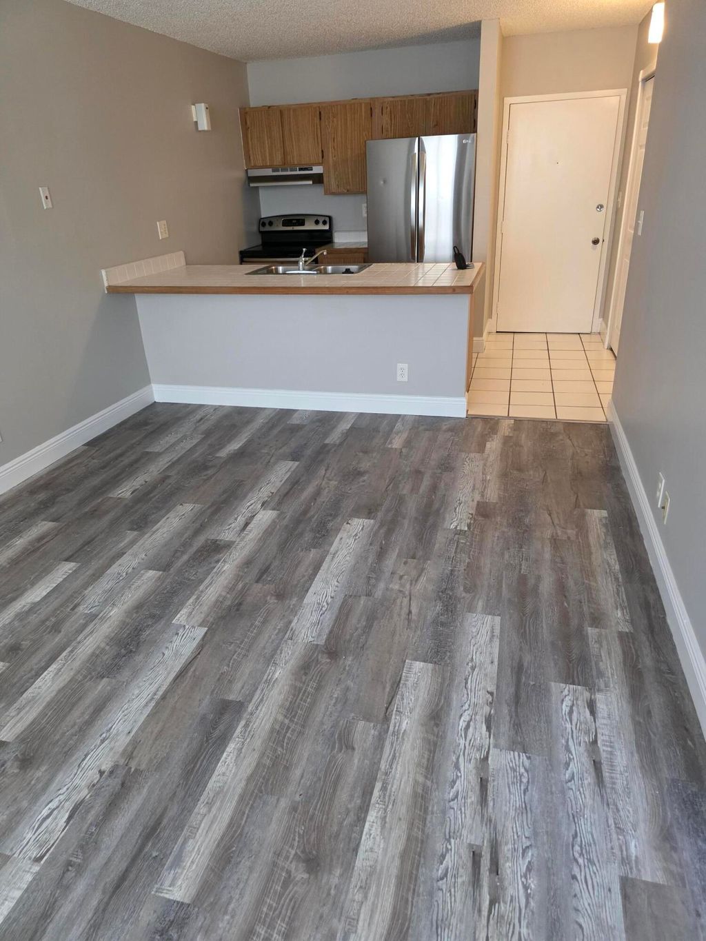 Photo of 2401 Riverside Drive #411-b, Coral Springs, FL 33065 (MLS # B26045746)
