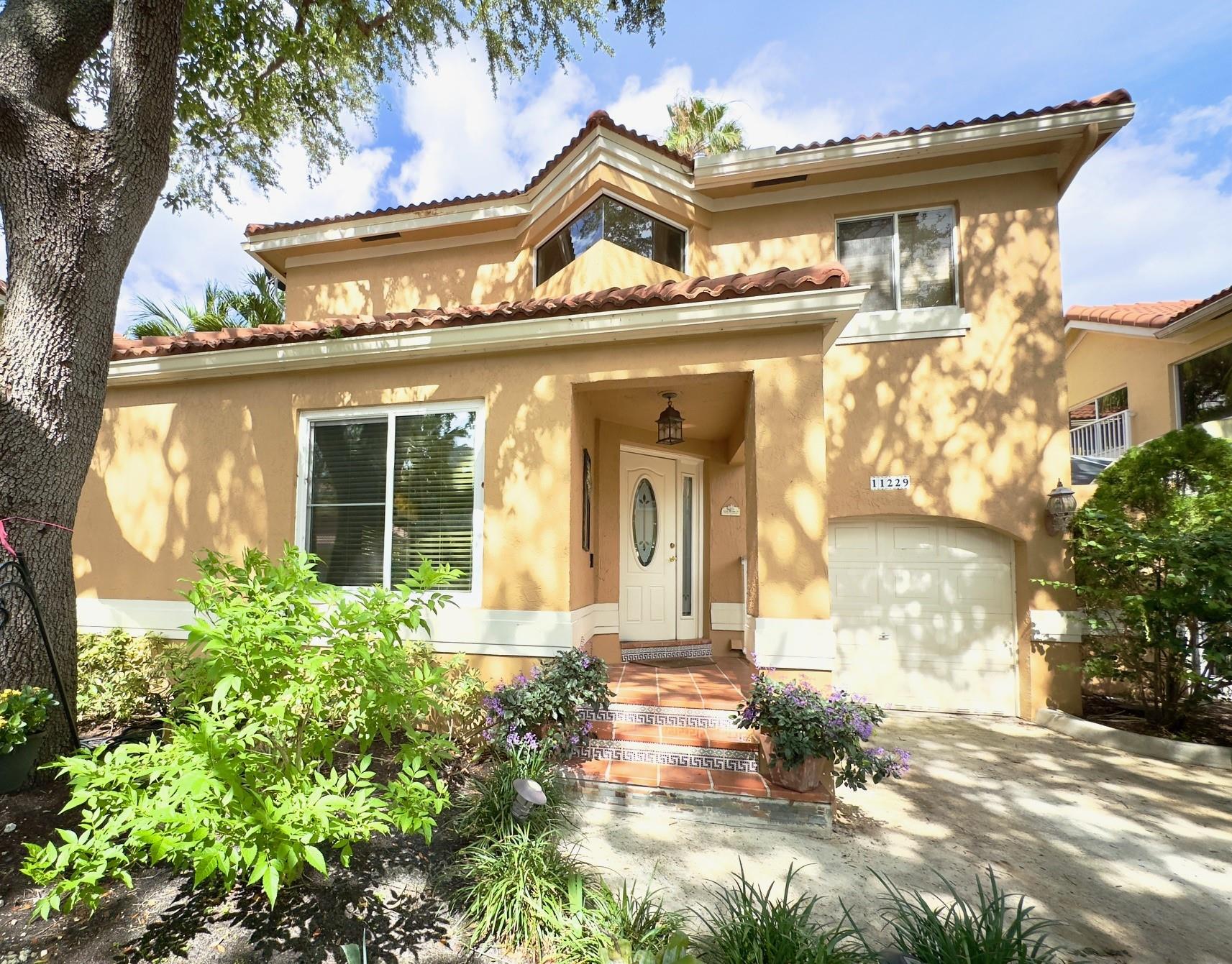Charming Home West Coral Springs in highly desirable neighborhood with upgrades. Spacious kitchen with lots of cabinet space and stainless steel appliances. New dishwasher and built in microwave. Jack and Jill bathroom. Principal bathroom has separate shower and Roman tub. You will love the serenity that the spacious backyard has to offer, with lush landscaping, gazebo, and barbecue grill. Ring camera conveys. Near shopping center, park, and place of worship.