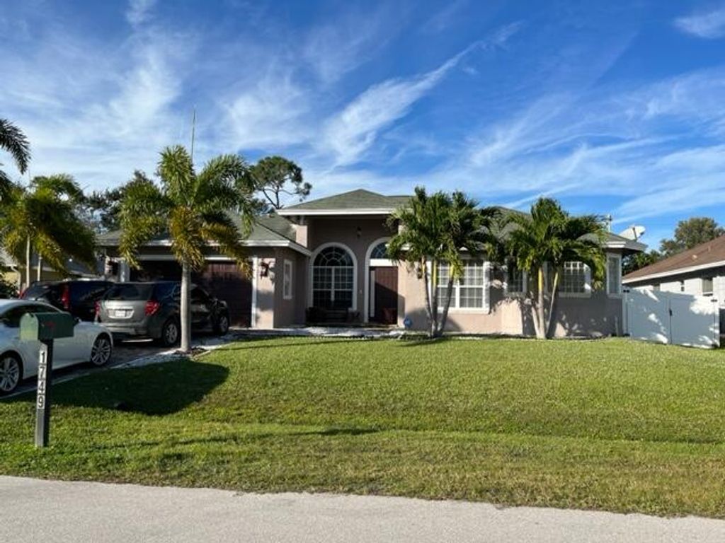 Photo of 1749 SW Desert Avenue, Port Saint Lucie, FL 34953 (MLS # R10938144)