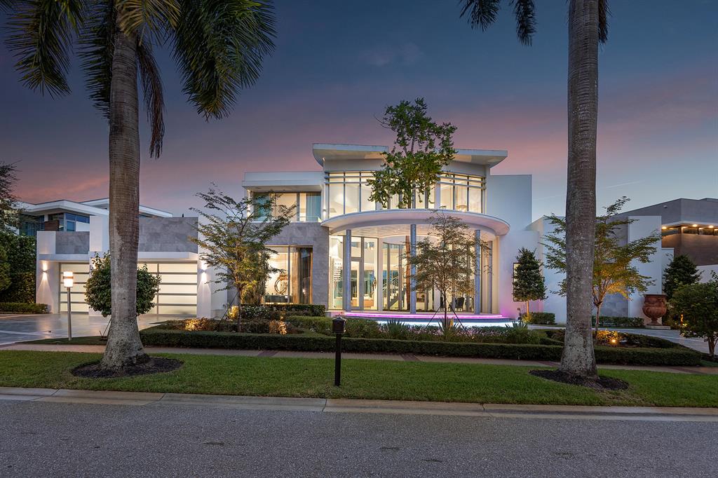 As seen in Architectural Digest, 'Le Sumi' is a modern architectural treasure built in 2020 by premier architect Randall Stofft. This exceptional custom residence blends dramatic details with cutting-edge amenities, offering a premier living experience. Like living in the pages of a design magazine, every detail of this 5 bedroom 5 bathroom 2 half bath home has been thoughtfully planned and appointed. Inside, artistic form meets function with bespoke detailing and elevated designs. From the breathtaking curves to the vast open spaces and grand ceilings, the residence is filled with natural light from early morning to sunset. Ideal for entertaining intimate groups or gracious large parties, the open concept greets guests with graciousness from the dramatic dining room,