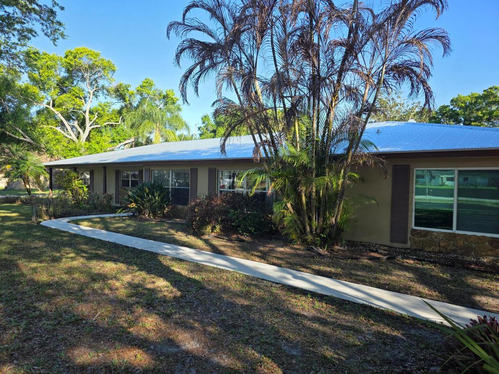 Photo of 5742 Briargate Lane, Fort Pierce, FL 34981 (MLS # R11170024)