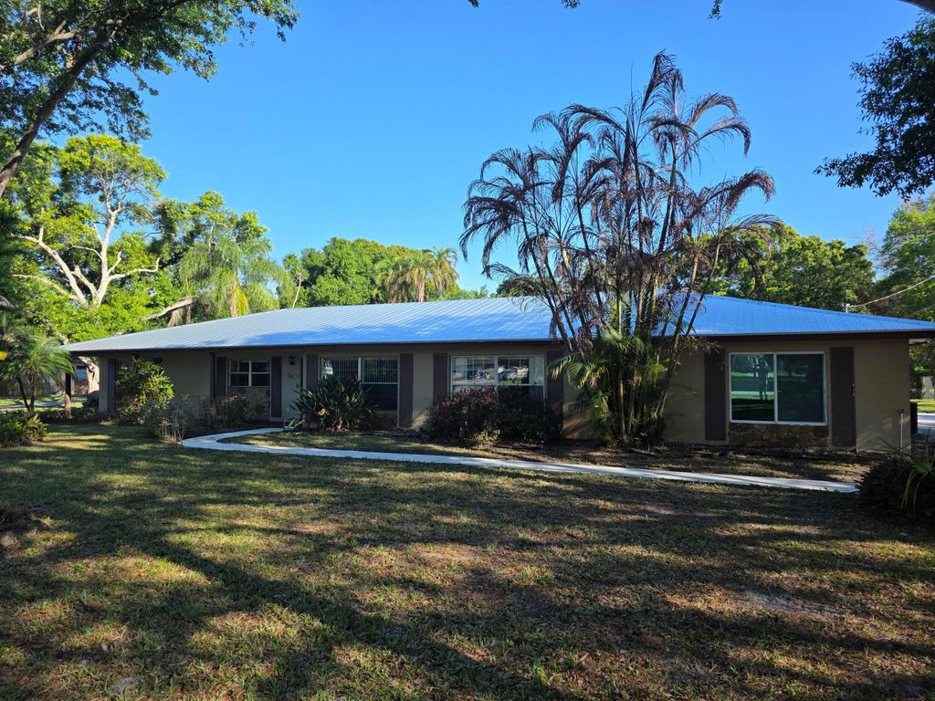 Photo of 5742 Briargate Lane, Fort Pierce, FL 34981 (MLS # R11170024)