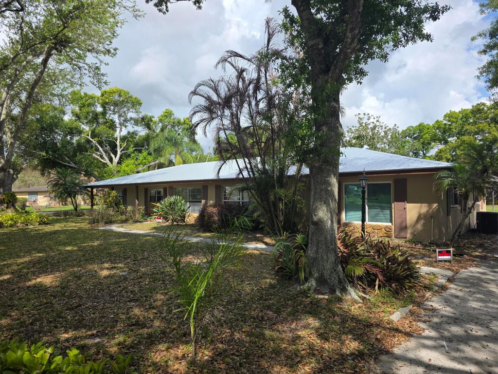 Photo of 5742 Briargate Lane, Fort Pierce, FL 34981 (MLS # R11170024)