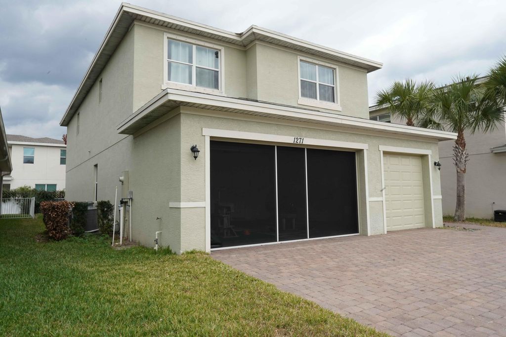 Photo of 1271 NW Leonardo Circle, Port Saint Lucie, FL 34986 (MLS # R11166267)