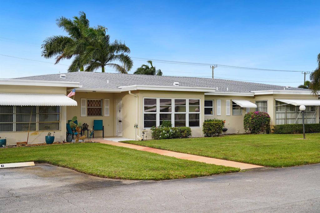 Photo of 301 Country Lane #C, Boynton Beach, FL 33435 (MLS # R11044391)