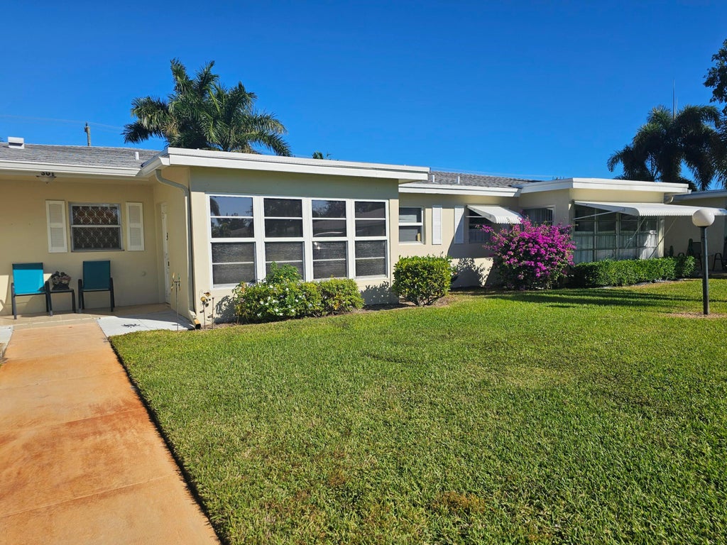 Photo of 301 Country Lane #C, Boynton Beach, FL 33435 (MLS # R11044391)