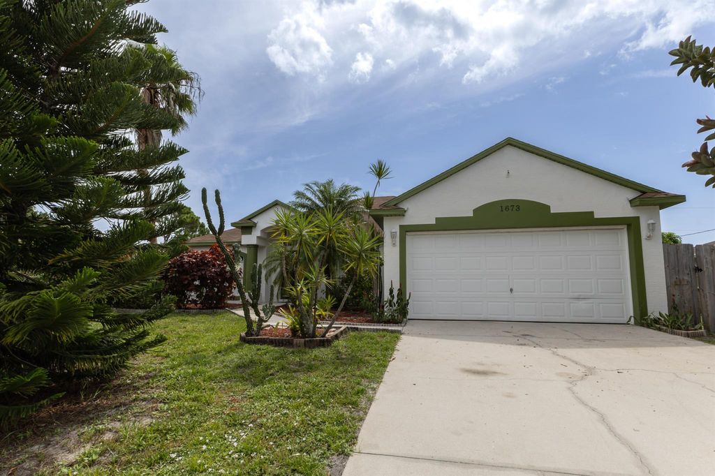Photo of 1673 SE Lorraine Street, Port St Lucie, FL 34952 (MLS # R10904088)