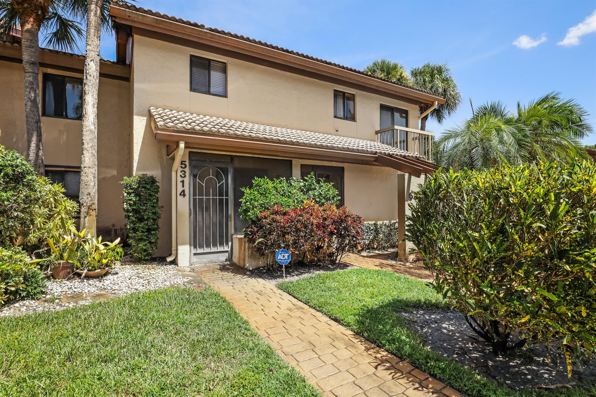 Step into this light-filled 2-bedroom (+Den), 2-bath condo in the sought-after gated community of The Fountains! Perched on the second floor, this home offers an open, airy layout with sweeping golf course views from your private balcony ; perfect for morning coffee or evening sunsets. The split-bedroom design ensures privacy, while the spacious primary suite features an on-suite bath and generous closets. Enjoy the relaxed Florida lifestyle with a sparkling community pool, beautifully maintained grounds, and 24/7 security. Country Club membership is optional ; membership is required to access golf, tennis, dining, and other club amenities. Ideally located close to shopping, dining, beaches, and major highways, this is the perfect place to call home year-round or seasonally!