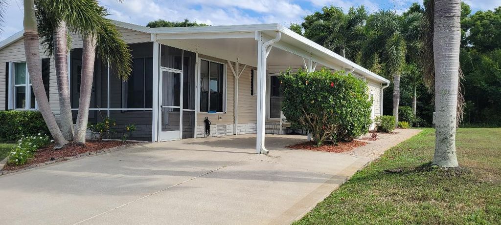 Photo of 251 Travis Cay Place #18, Fort Pierce, FL 34982 (MLS # R10972887)