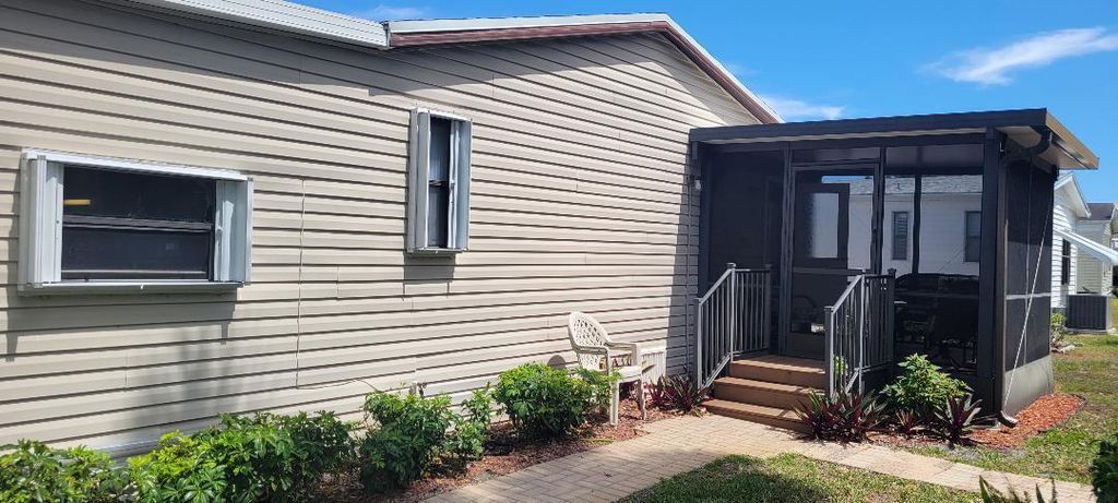 Photo of 251 Travis Cay Place #18, Fort Pierce, FL 34982 (MLS # R10972887)