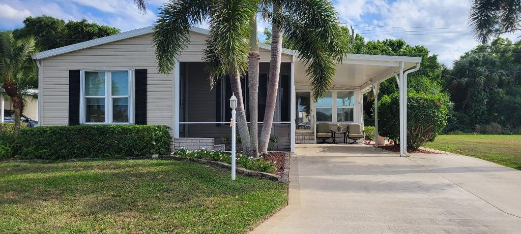 Photo of 251 Travis Cay Place #18, Fort Pierce, FL 34982 (MLS # R10972887)