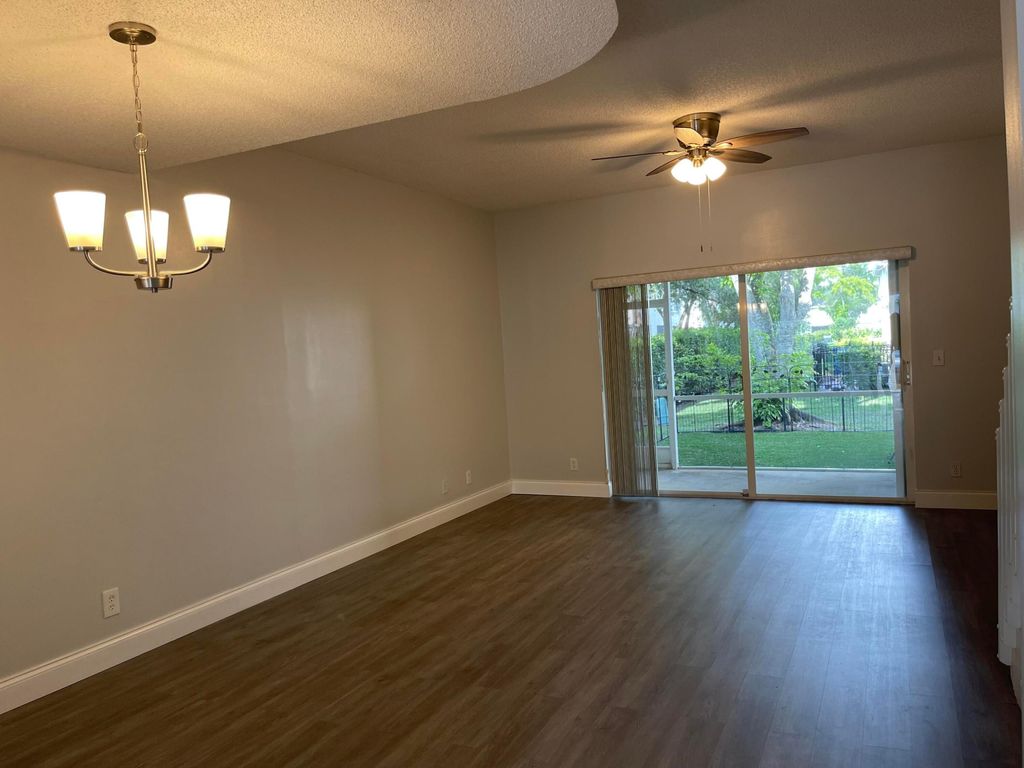 Photo of 5659 NW 99th Lane, Coral Springs, FL 33076 (MLS # B26003570)