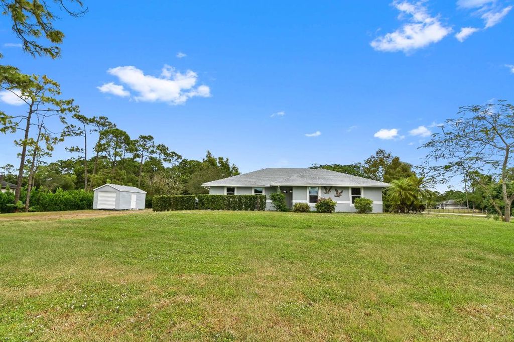 Photo of 18523 42nd Road N, Loxahatchee, FL 33470 (MLS # R10935349)