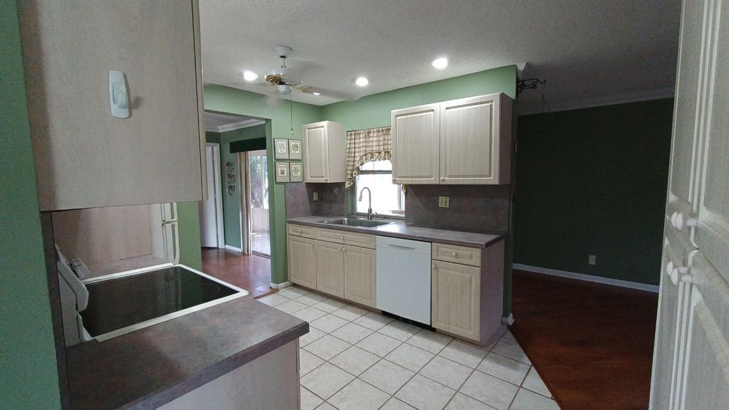 Photo of 1040 NW 49th Court, Deerfield Beach, FL 33064 (MLS # F10532728)