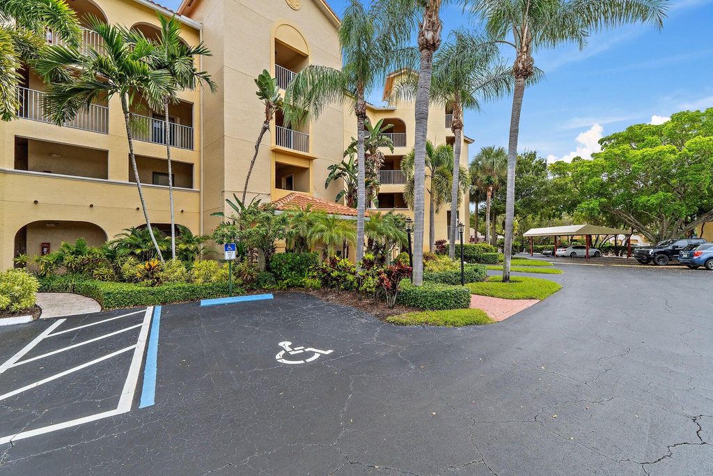 Photo of 300 Uno Lago Drive #204, Juno Beach, FL 33408 (MLS # R11120090)