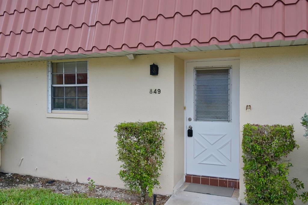 Photo of 849 Salem Lane Ln, Lake Worth Beach, FL 33467 (MLS # R10833219)
