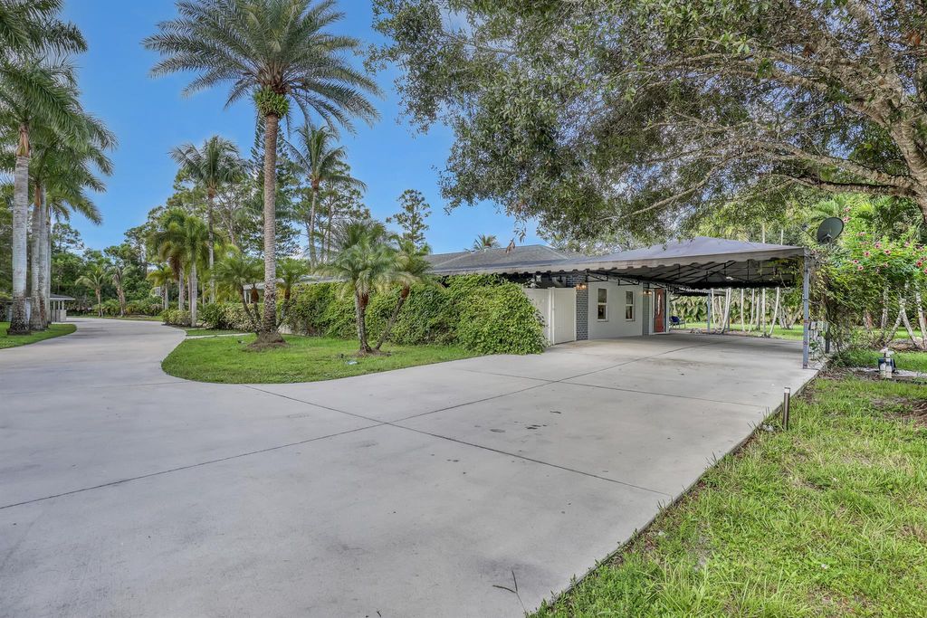 Photo of 10780 Anderson Lane, Wellington, FL 33449 (MLS # R11135936)