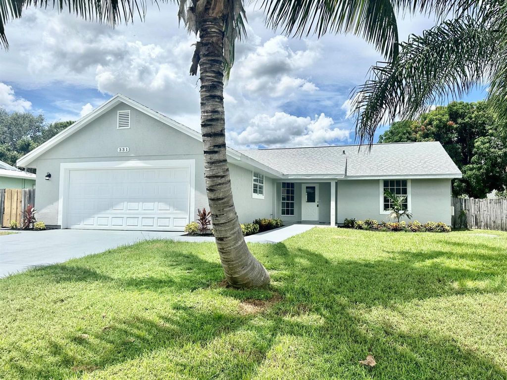 Photo of 331 SE Volkerts Terrace, Port St Lucie, FL 34983 (MLS # R10912433)