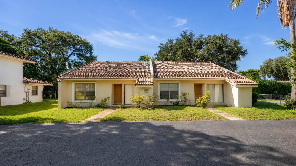 Photo of 10880 NW 45th Street, Coral Springs, FL 33065 (MLS # B26077440)