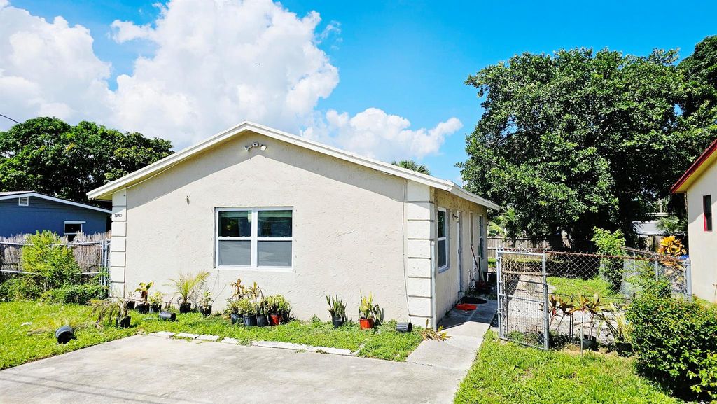 Photo of 1340 W 35th Street, Riviera Beach, FL 33404 (MLS # R11026266)