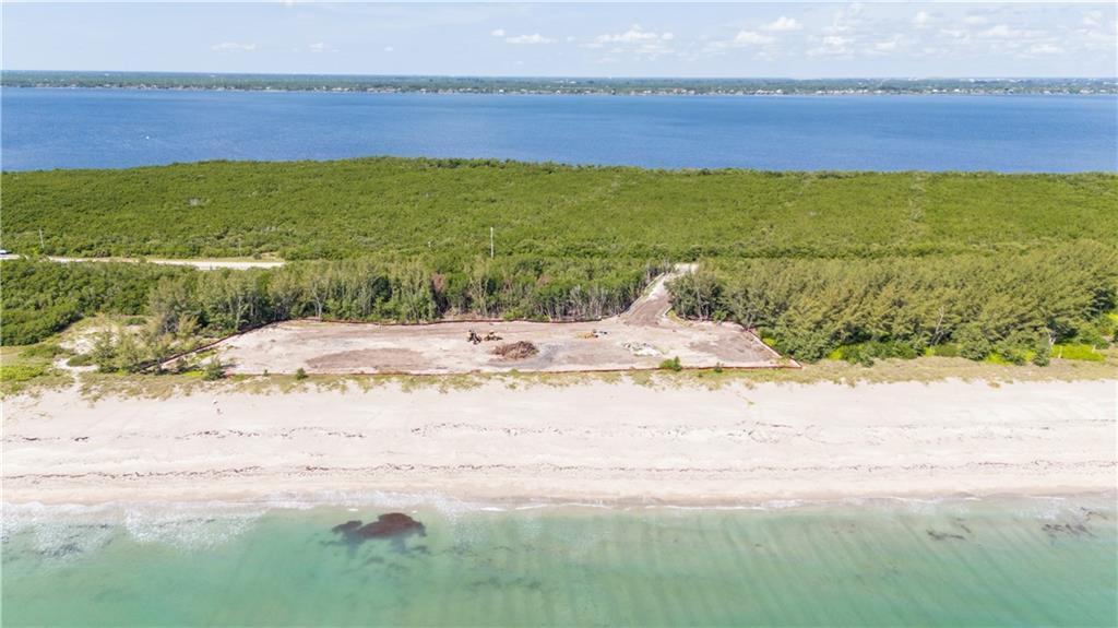This unique opportunity features 7 permitted, exceptionally wide 80 ft oceanfront lots, perfect for sprawling luxury residences. All infrastructure and utilities are in place. Permits are in process for 7 docks with a boardwalk leading from A1A to the Indian River, providing a highly coveted ocean-to-inlet lifestyle that is just minutes from the ocean inlet by boat. With the potential for additional lots, the stage is set for an exciting and prestigious new development. Seize this unparalleled opportunity now!