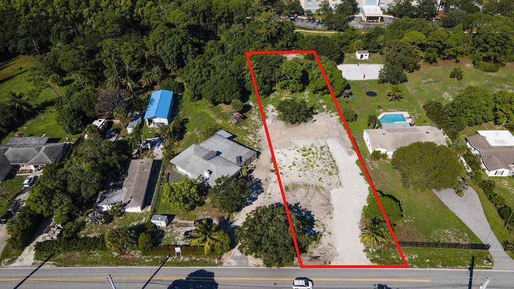 Permitted uses include: daycare, school, place of worship, nursery and agricultural. Plans ready to build a 2688 square foot, 4 bedroom 3 bath home. Nearly an acre on High Ridge Road. 100' of frontage, stretching 385' deep, located directly across from a protected nature preserve in Unincorporated Palm Beach County. 1/2 mile to I-95. Plans are available and lot has been prepared for building and permits have been pre-approved by the county. Site work done includes: surveying, soil tests, design/ drafting of plans, building permit fees, clearing, excavation, hauling, septic system and engineering. Adjacent property at 7361 High Ridge Road that includes a structure is also available for sale at $499,000. Both lots together make up 1.77 acres