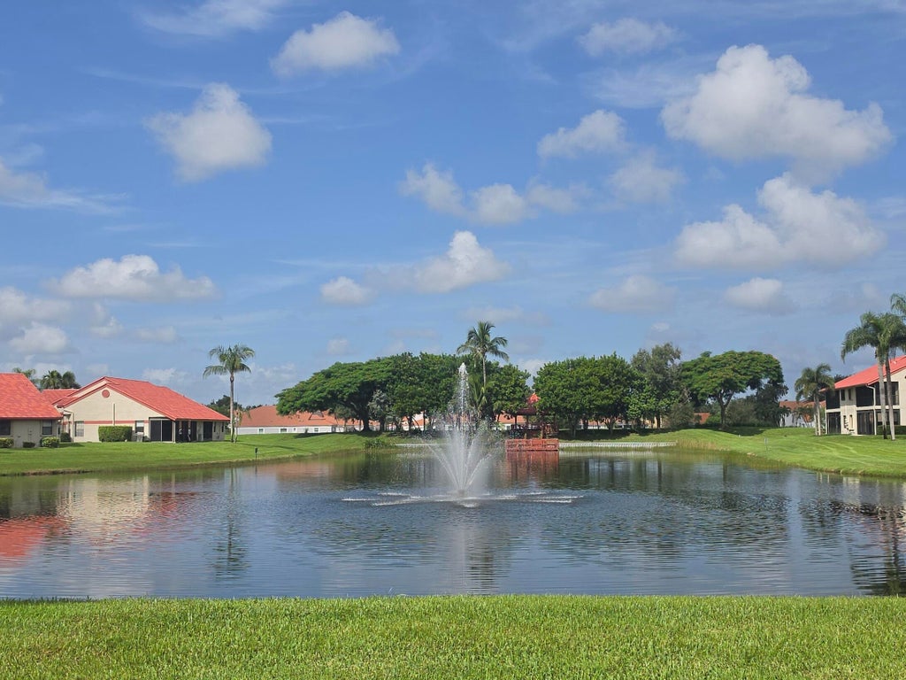Photo of 7852 Lexington Club Boulevard #B, Delray Beach, FL 33446 (MLS # B26075473)
