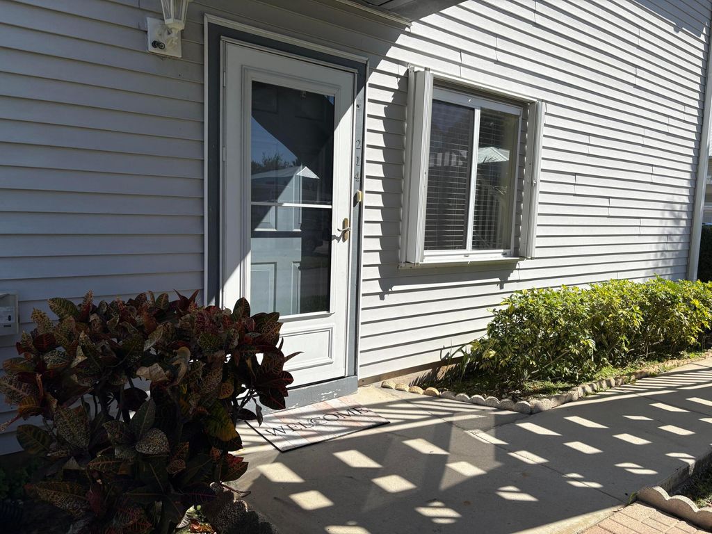 Photo of 214 SE Village Drive, Port Saint Lucie, FL 34952 (MLS # R11166331)