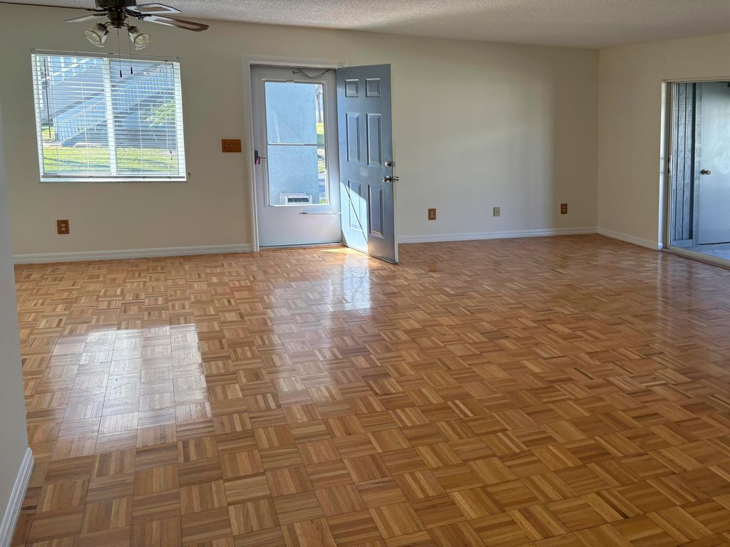 Photo of 214 SE Village Drive, Port Saint Lucie, FL 34952 (MLS # R11166331)