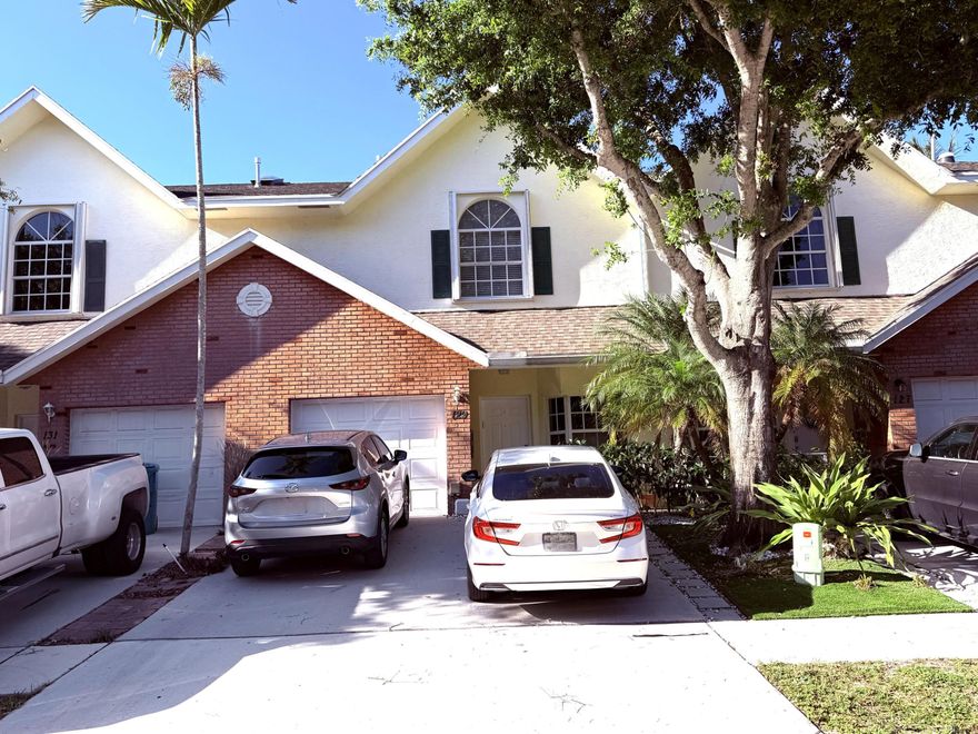 Super Rare to find, townhouse in the gated Cedar Ridge Estates, spacious 3-bed, 2.5-bath with 1-car garage. This unique home includes a finished basement ideal for an office, a 4th bedroom, storage, or gym. Residence is also equipped with a central vacuum system, accordion shutters on the upper windows, panels on the 1st level, and an Argentine outdoor grill. This gorgeous home features an open-concept kitchen/dining area, an upgraded and redesigned kitchen, and Stair Railings. Also, high-quality wood floors, tile floors, and soaring ceilings. The primary bath offers his & hers sinks and a walk-in glass shower. Conveniently located near I-95, shopping centers, dining, beaches, and within walking distance to Lake Worth Christian School and Imagine Chancellor Charter School.  Roof 2021, AC 2023, water heater 2021. Schedule your private tour today!