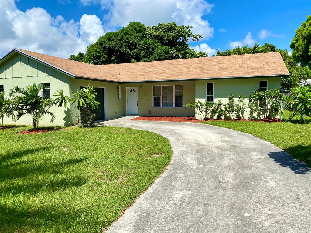 Great 3 Bedroom 2 Bathroom Single Family Home in the heart of West Palm Beach! Walking distance to Shopping & DIning at the Palm Beach Outlets. Centrally located to I95 and the Florida Turnpike. Recently updated with New HVAC Unit (3 Ton High-Efficiency), New Electric Water Heater, Interior Painting, New Interior Doors, Newer Roof and more! Enjoy not having a HOA to worry about or pay monthly. Schedule your private tour today!