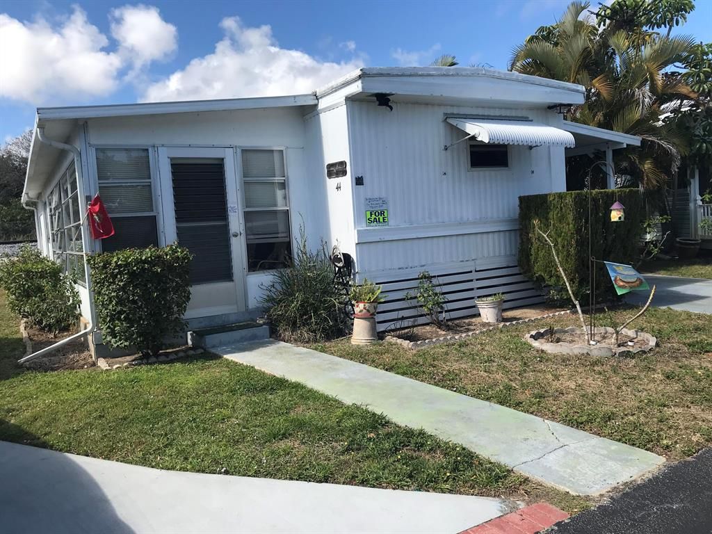 Photo of 13827 S Indian River Drive #44, Jensen Beach, FL 34957 (MLS # R10779696)