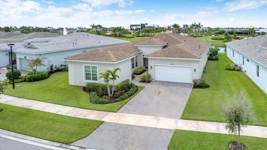Photo of 10438 SW AQUILA Way, Port Saint Lucie, FL 34987 (MLS # B26061708)
