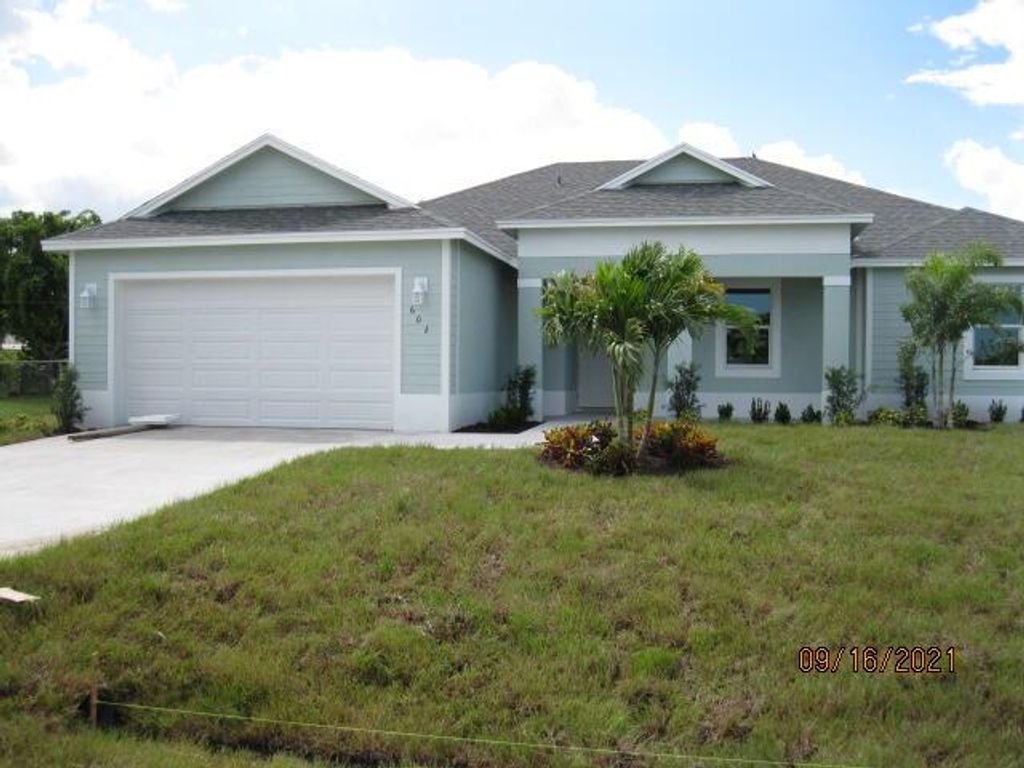 Photo of 602 SW Cynthia Street, Port Saint Lucie, FL 34983 (MLS # R10749258)