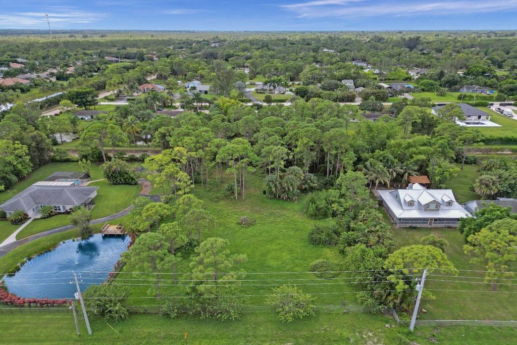 Photo of 11094 Orange Boulevard, The Acreage, FL 33412 (MLS # R10987699)