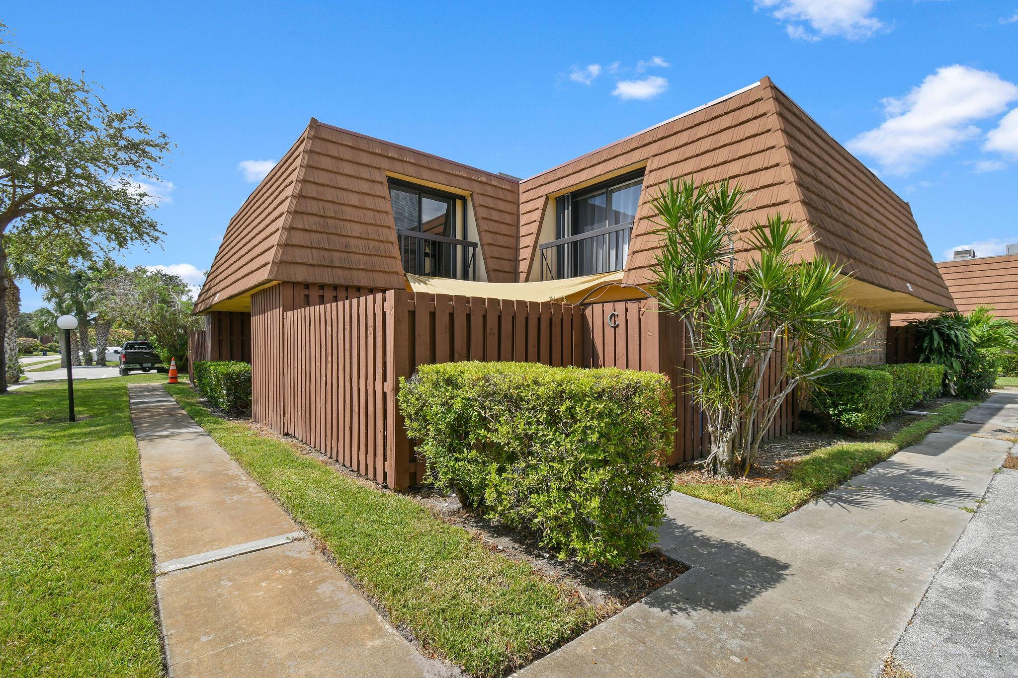 Beautifully renovated 2-bedroom, 2.5-bath townhouse available for annual rental in highly sought-after Jupiter Plantation. Just steps from the scenic Loxahatchee River and the waterfront community pool, this updated home features luxury vinyl plank flooring, crown molding, custom cabinetry, granite countertops, and a stylish bar top--perfect for entertaining. Upstairs, you'll find two spacious bedroom suites with updated bathrooms and private balconies offering tranquil views. Centrally located near beaches, shopping, dining, and all that Jupiter has to offer.