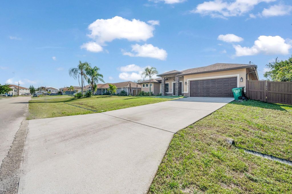 Photo of 642 SW Icon Avenue, Port Saint Lucie, FL 34953 (MLS # R10951684)