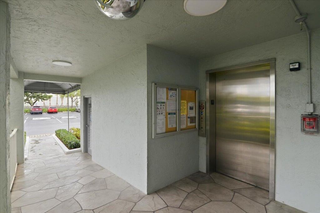 Photo of 2220 N Cypress Bend Drive #410, Pompano Beach, FL 33069 (MLS # B26005028)