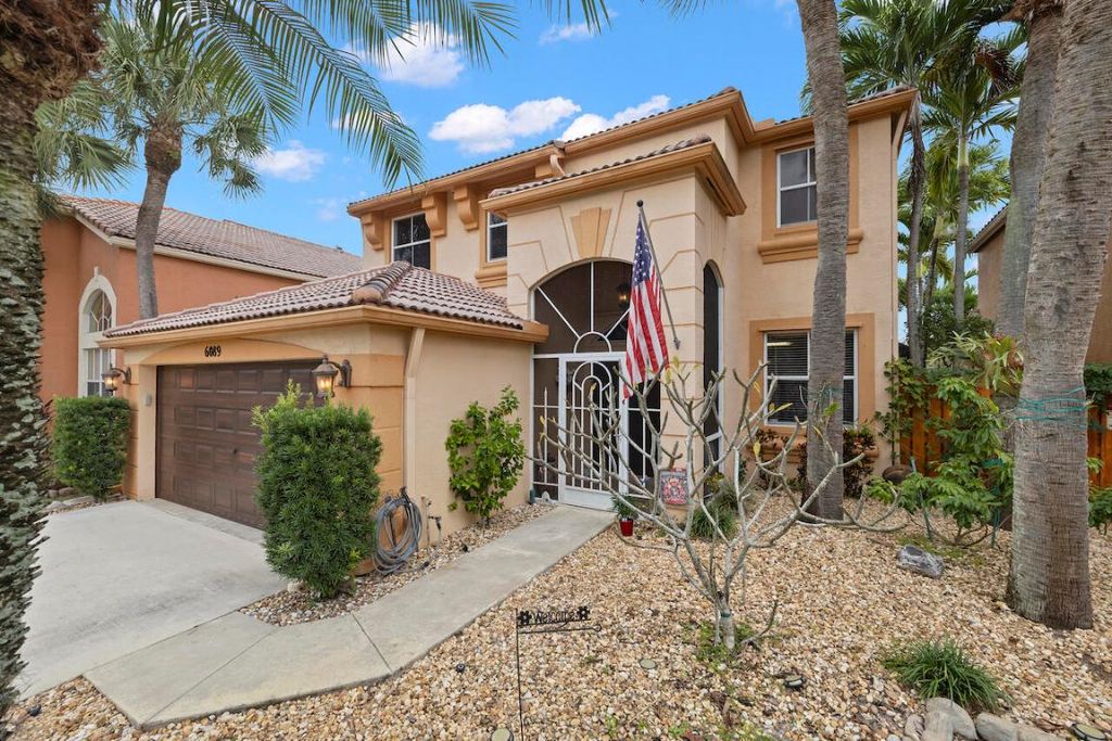 Photo of 6089 Oak Bluff Way, Lake Worth, FL 33467 (MLS # R10941230)