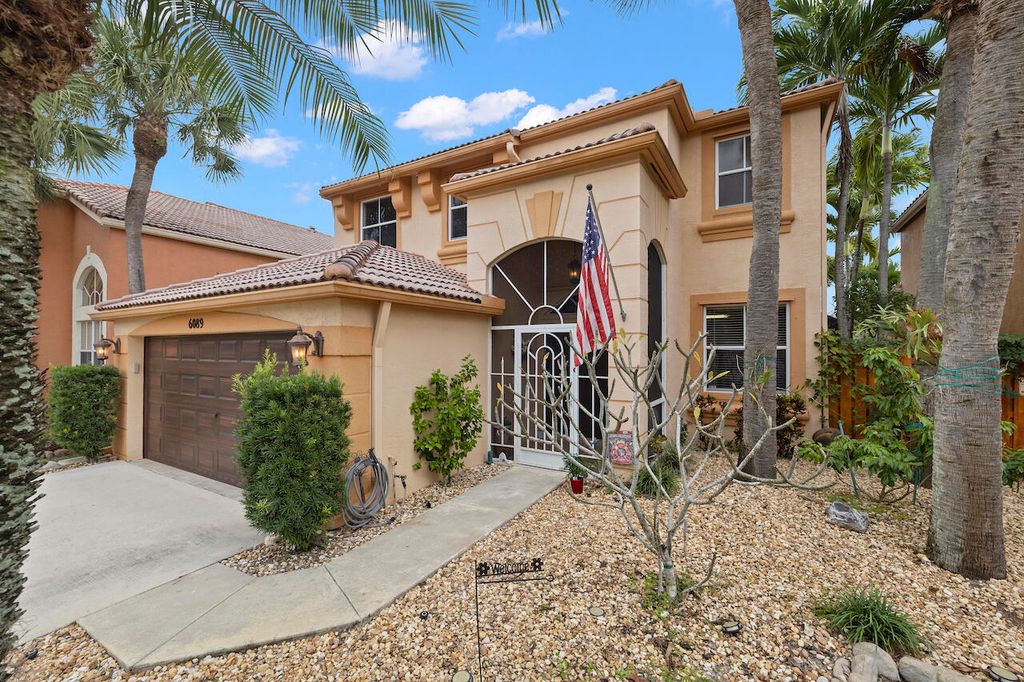 Photo of 6089 Oak Bluff Way, Lake Worth, FL 33467 (MLS # R10941230)