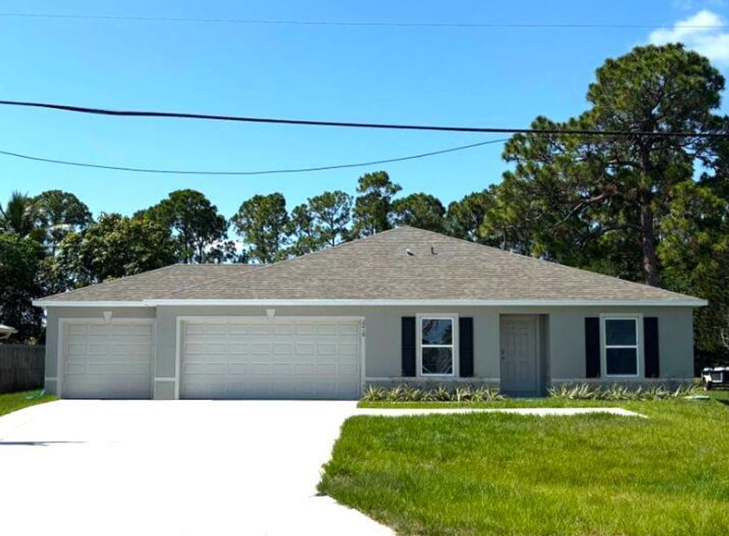 Photo of 2218 SE Grand Drive, Port Saint Lucie, FL 34952 (MLS # R11079627)