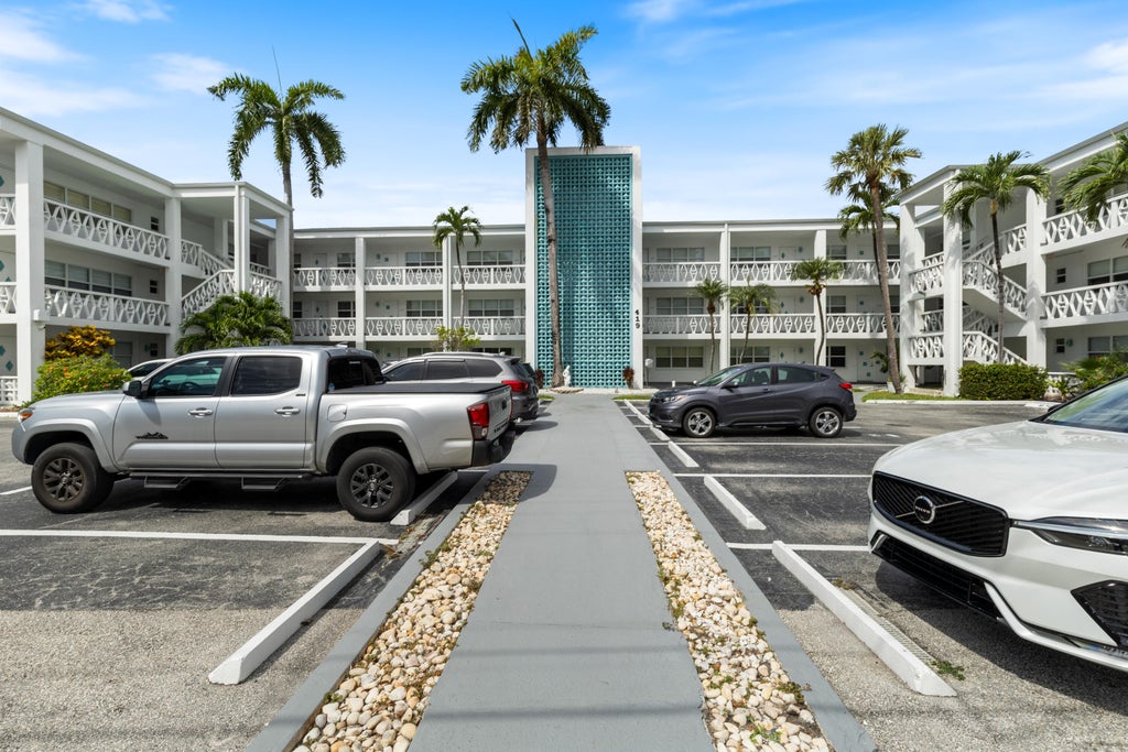 Photo of 419 Golden Isles Drive #210, Hallandale Beach, FL 33009 (MLS # B26050363)